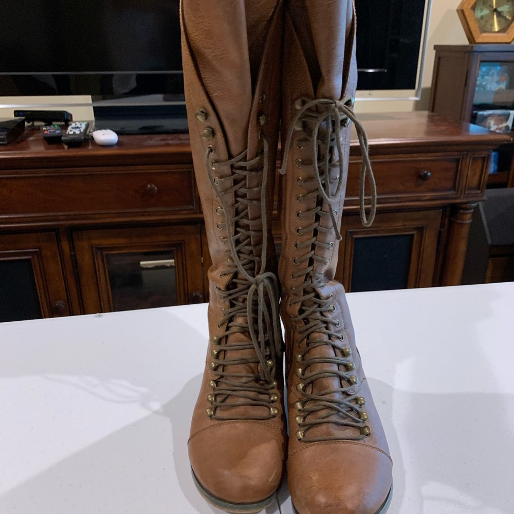 Tall lace up boots
